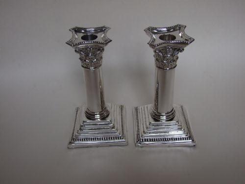 A Fabulous Pair of Victorian Silver Candlesticks.