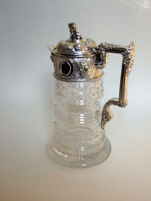 A Magnificent Victorian Silver Plated Claret Jug.