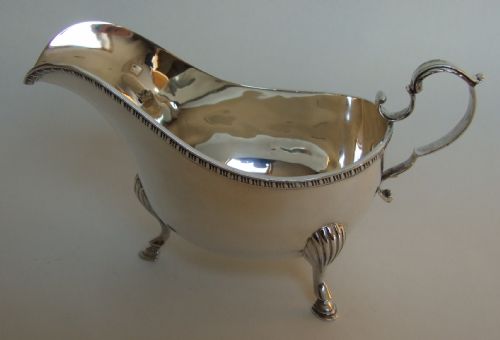 A Large Edwardian Silver Gravy Boat.