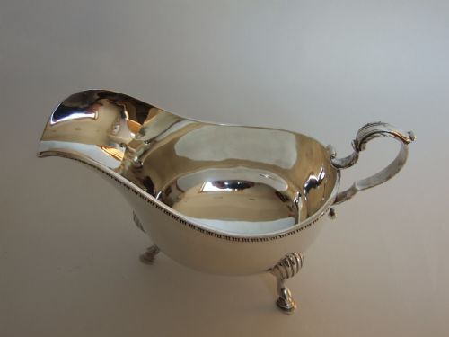 fig 1. A large Edwardian silver gravy boat.