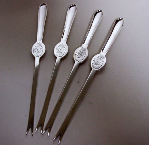 An Extremely Rare Set of Four Victorian Silver Lobster Picks.