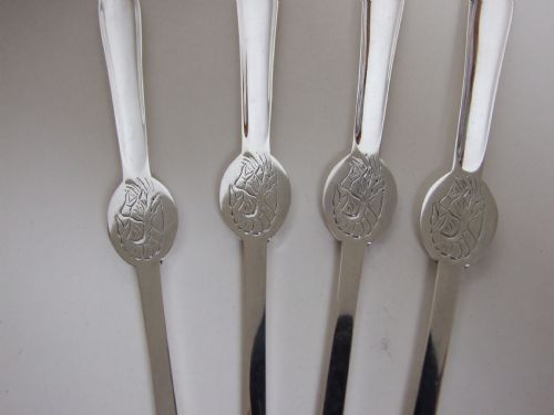 fig 1. An extremely rare set of four Victorian silver lobster picks.