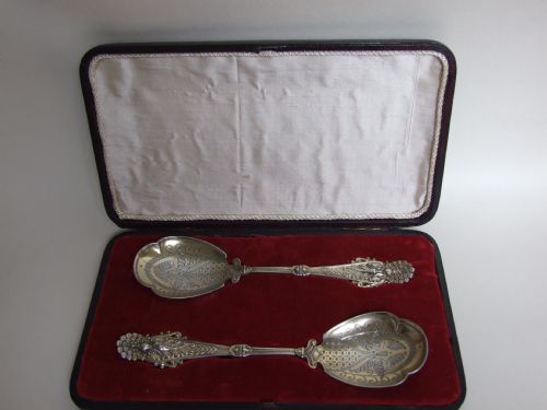 fig 1. A fabulous pair of boxed Victorian silver gilt dessert servers.