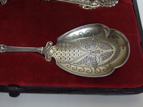 fig 2. A fabulous pair of boxed Victorian silver gilt dessert servers.