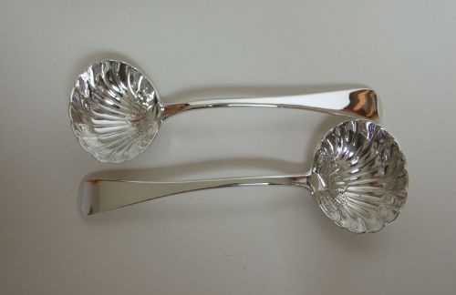 fig 1. A superb pair of William IV silver gravy ladles.
