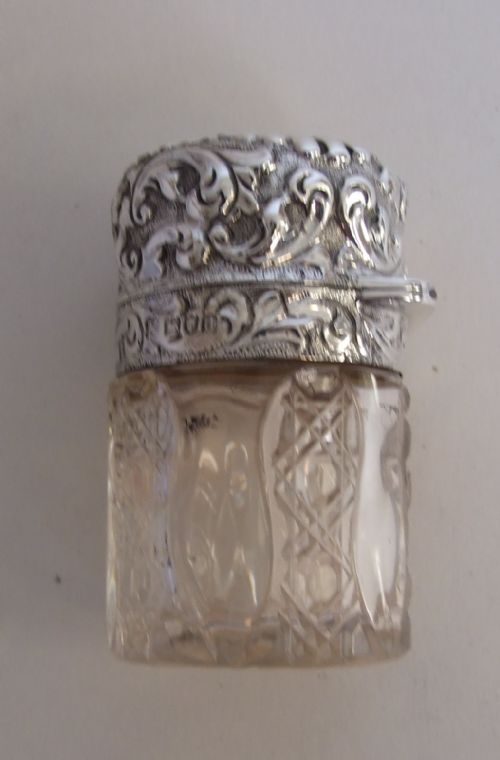 A Splendid Victorian Silver Mounted Salts/cologne Bottle.