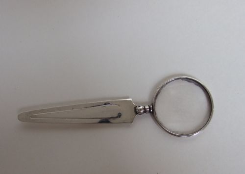 fig 1. A Chester silver magnifying glass/bookmark combination.