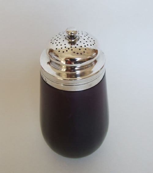 fig 1. A rare William IV silver mounted amethyst glass caster.