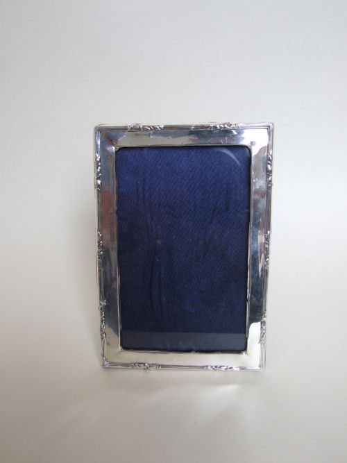 fig 1. A useful and attractive silver photo frame of portrait/landscape form.