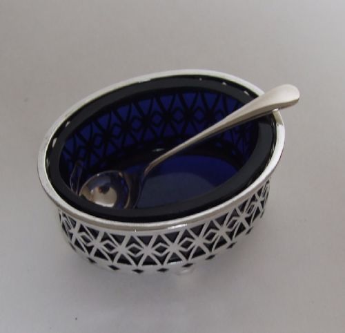 fig 1. A lovely Victorian pierced silver salt tub and spoon.