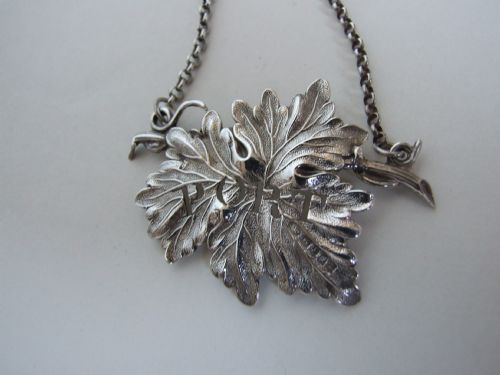 fig 1. A handsome William IV pierced silver leaf Port label.