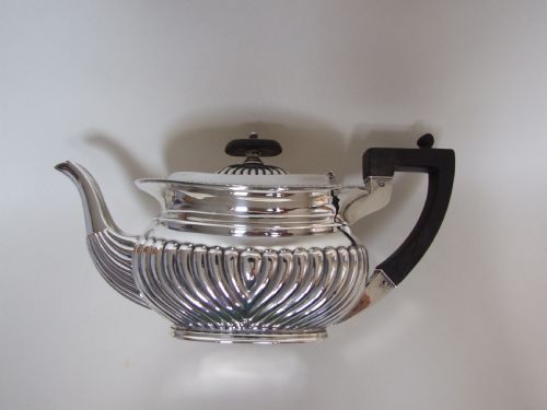A Lovely Small Victorian Silver Teapot. Four Cups Capacity.