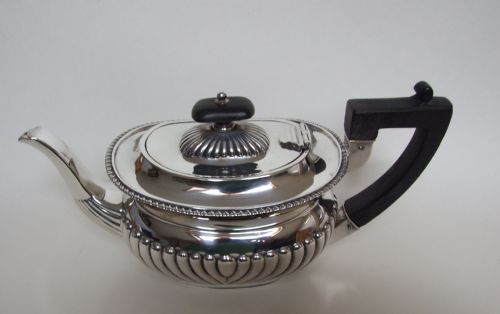 fig 1. A lovely small Victorian silver teapot. Four cups capacity.