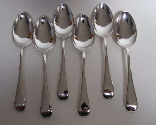 Six George V Silver Dessert Spoons in Old English Pattern.