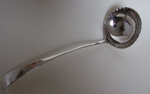 A Wonderful George II Silver Soup Ladle.
