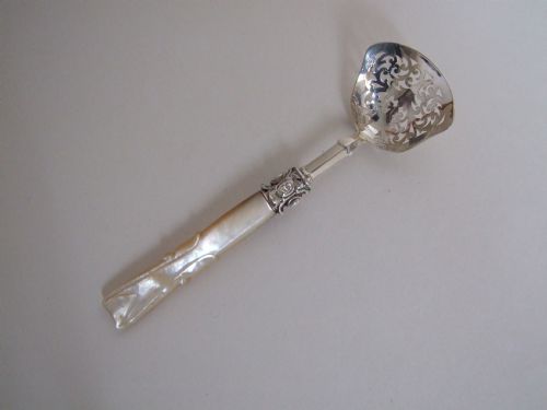 An Unusual Early Victorian Silver & Mother-of-pearl Sifter Spoon.