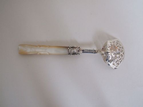 fig 1. An unusual early Victorian silver & mother-of-pearl sifter spoon.