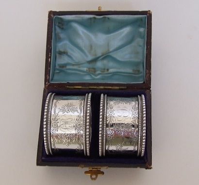 A Rare Pair of Victorian Boxed Silver Napkin Rings.