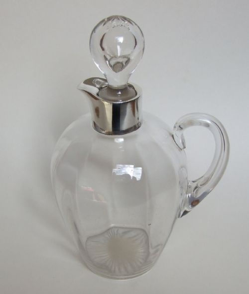 A Superb Silver Mounted Whisky Flask and Stopper.