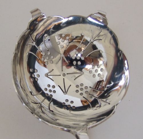 fig 1. A gorgeous George V silver tea strainer.