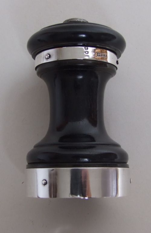 fig 1. A Victorian silver and ebony pepper grinder.