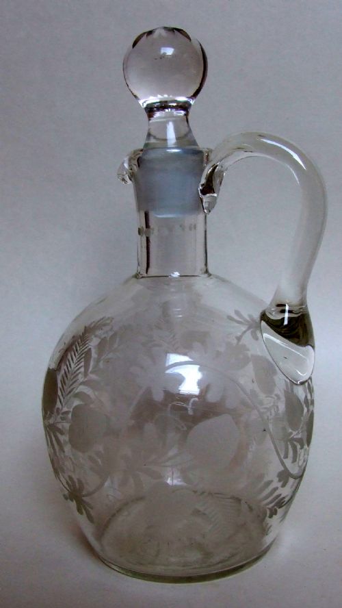 A Victorian Etched Wine Jug and Stopper.