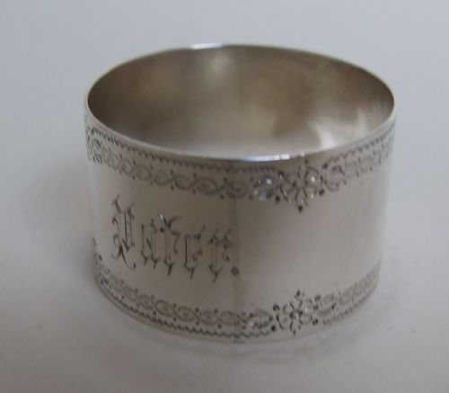 A Victorian Silver Napkin Ring Engraved 'Pater'.