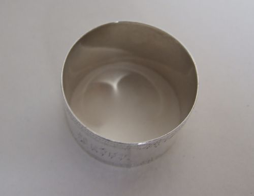 fig 1. A Victorian silver napkin ring engraved 'Pater'.