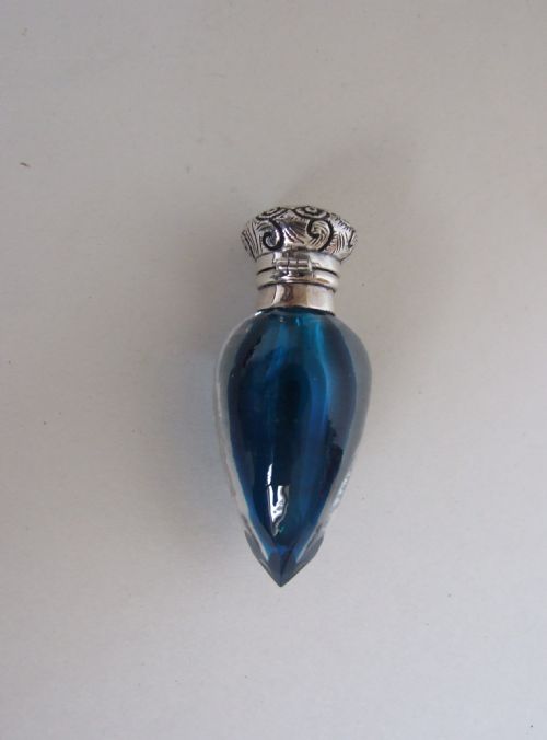 fig 1. A rare Victorian silver mounted scent bottle in petrol blue.