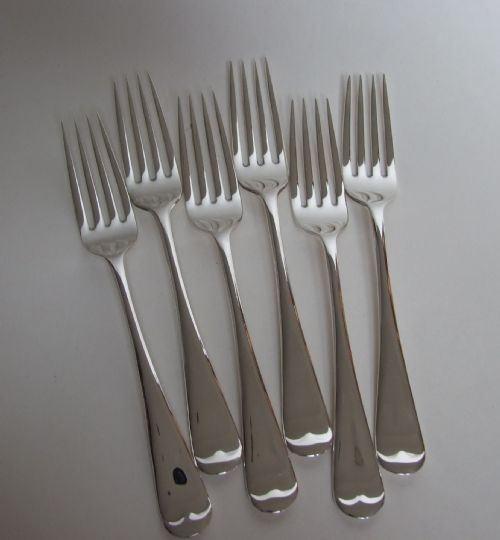 A Fine Set of Six Silver Table Forks in Old English Pattern.