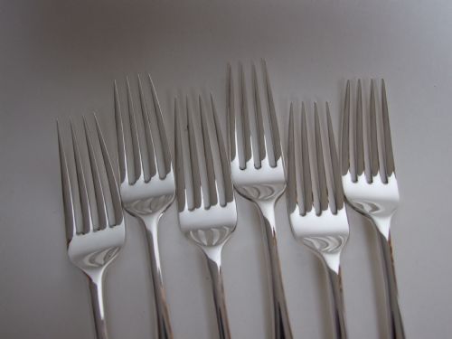 fig 1. A fine set of six silver table forks in Old English pattern.