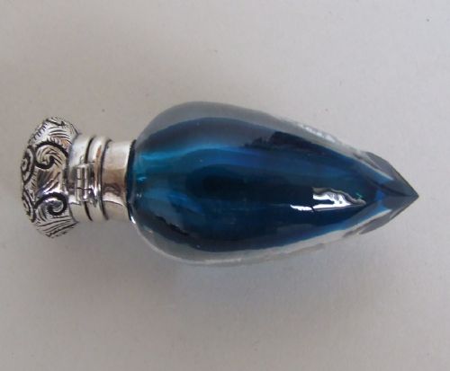 A Rare Victorian Silver Mounted Scent Bottle in Petrol Blue.