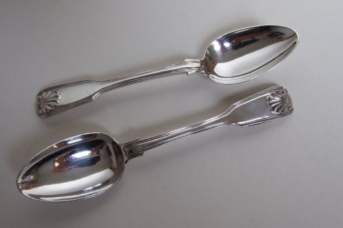 A Pair of Victorian Fiddle, Thread & Shell Silver Dessert Spoons.