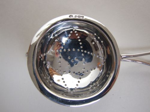 fig 1. A charming First World War period silver teastrainer.