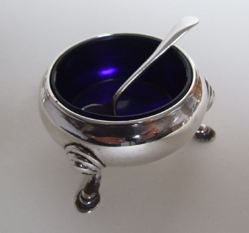fig 1. A handsome three piece silver cruet with Onlsow pattern thumb grip.