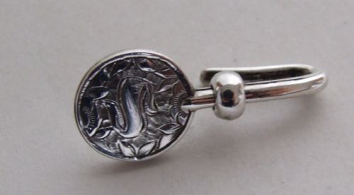 A Delightful Victorian Silver Napkin Clip.
