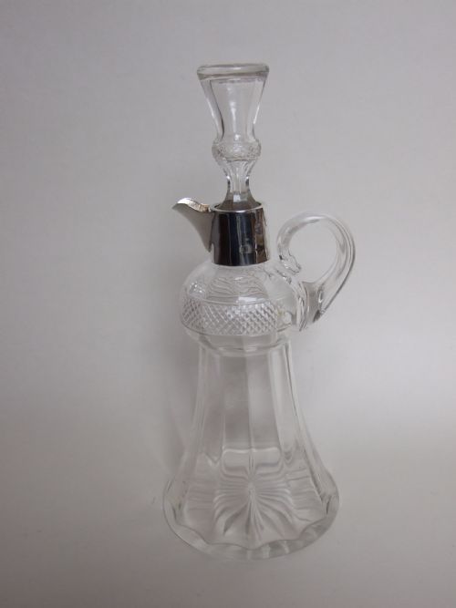 fig 1. A superb Edwardian silver mounted Whisky jug.