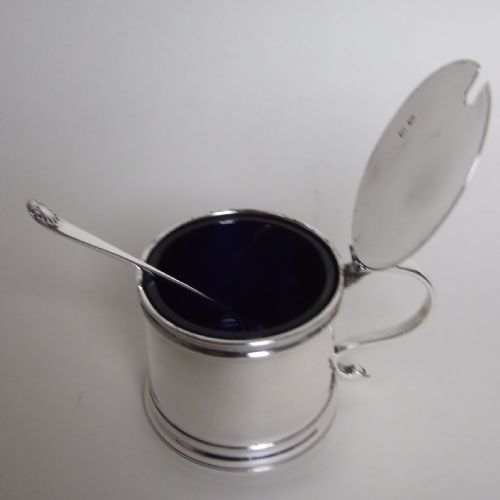 fig 1. A large silver drum mustard and matching spoon.