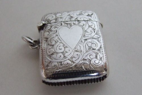 fig 1. A charming Edwardian silver vesta with heart shaped cartouche.
