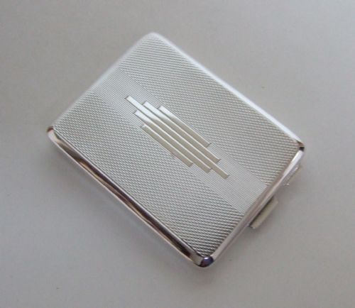 A Fabulous Art Deco Silver Match Book Holder..