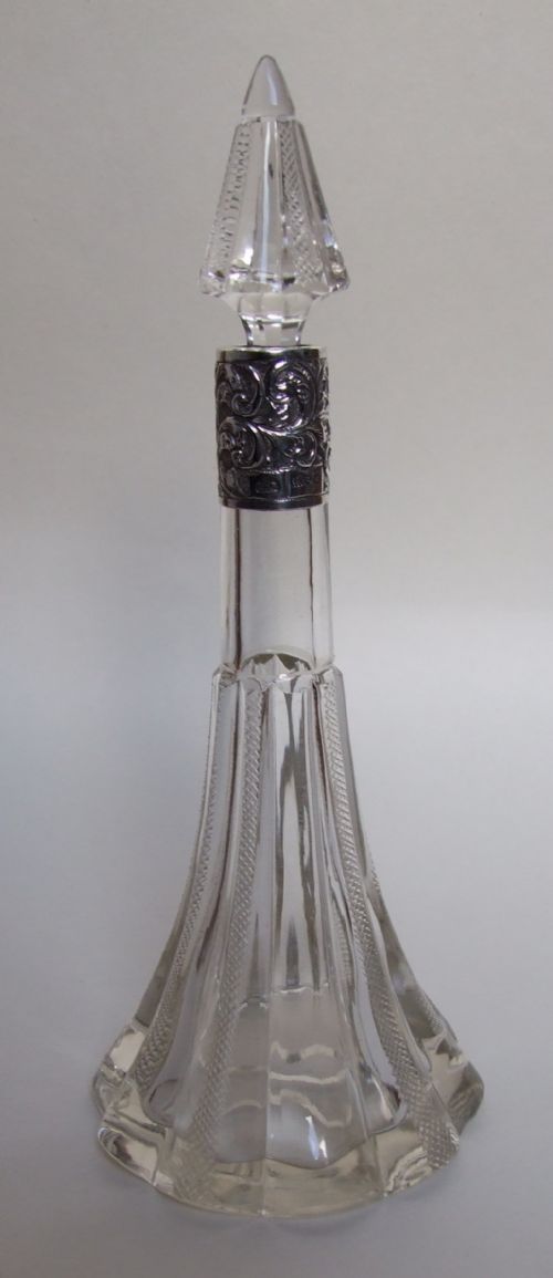 A Gorgeous Victorian Silver Mounted Cologne Bottle.
