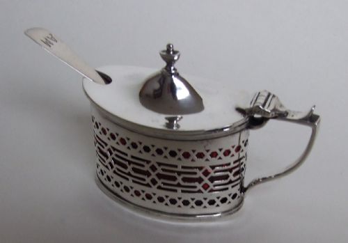A Handsome Silver Mustard Pot with Unusual Cranberry Liner.