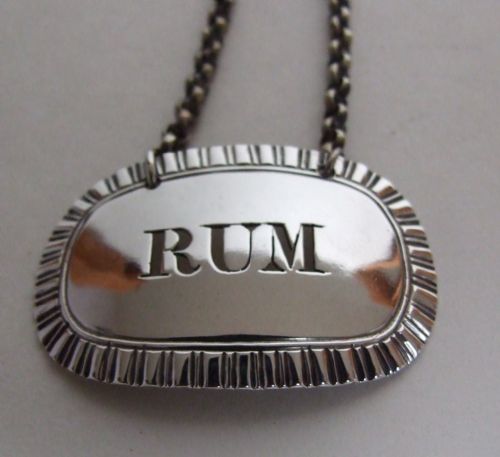 An Attractive William IV Silver 'Rum' Label.