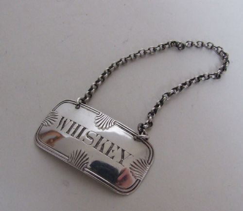 fig 1. A rare early Victorian silver Whiskey label.