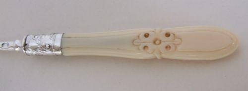 fig 1. A beautiful pierced silver serving afternoon tea fork.
