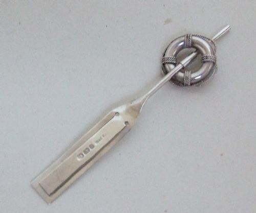Rowing Interest. A Rare Victorian Silver Bookmark with Oar and Life Buoy.