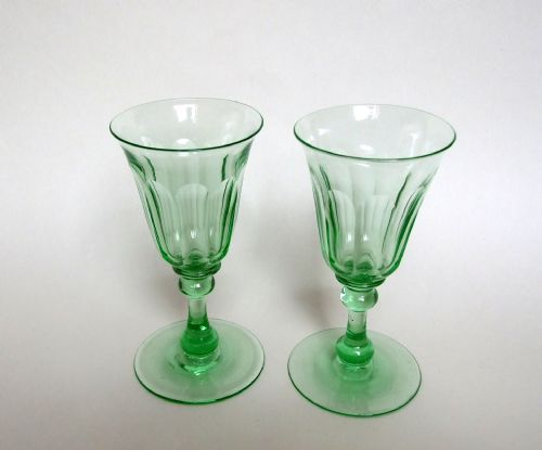 An Attractive Pair of Victorian Uranium Green Wine Glasses.