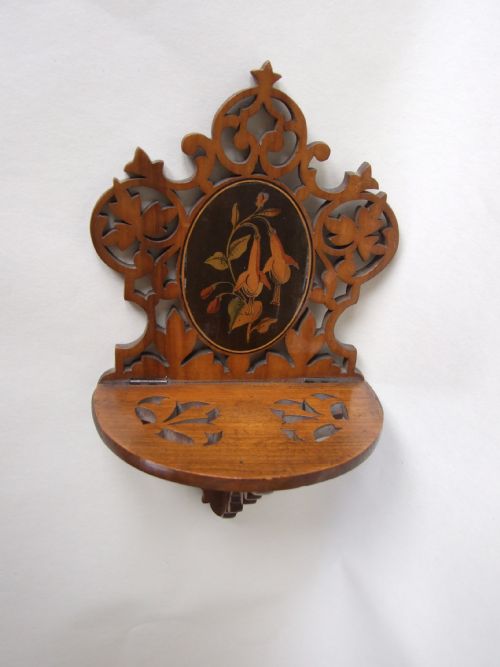 fig 1. A delightful Art Nouveau small carved wall bracket with inlaid flowers.