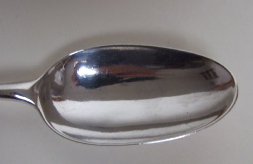 fig 1. A superb George II silver serving spoon.