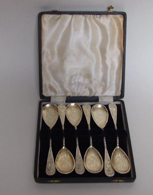 A Fabulous Set of Six German Silver Gilt Sorbet Spoons.